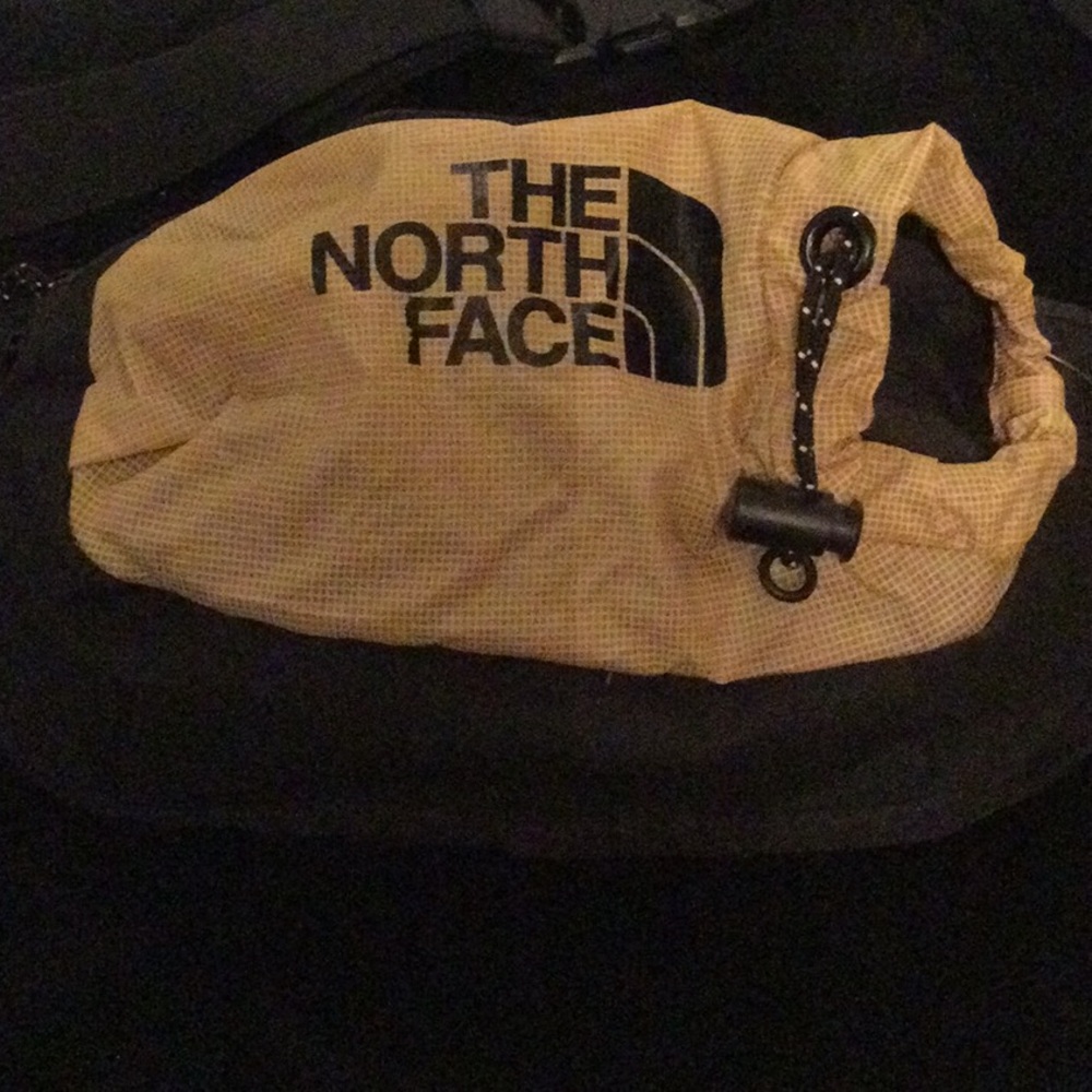 The North Face Yellow and Black Bag